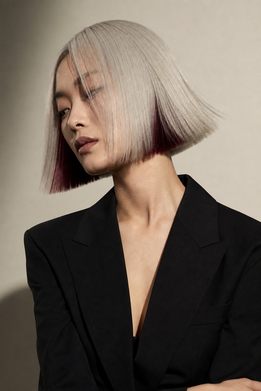 Precision platinum bob with oxblood underlayer